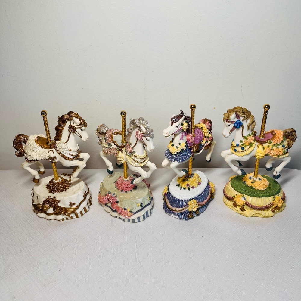Heritage House carousel Figurines. Set of 4. Collectible